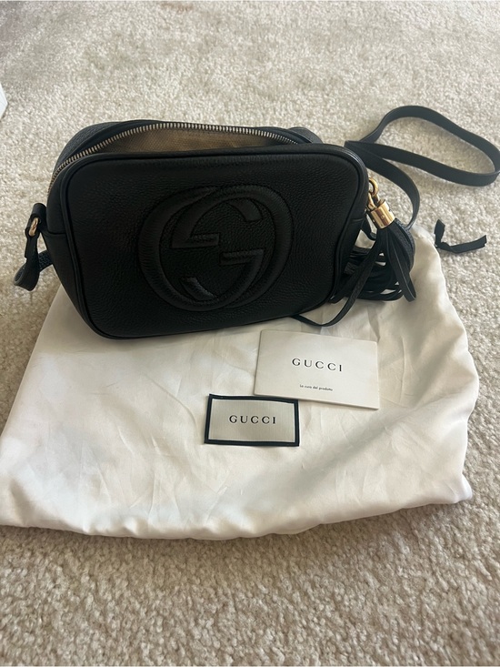 Gucci Handbags - Gucci Black Pebbled Leather Crossbody with Gold Tassel